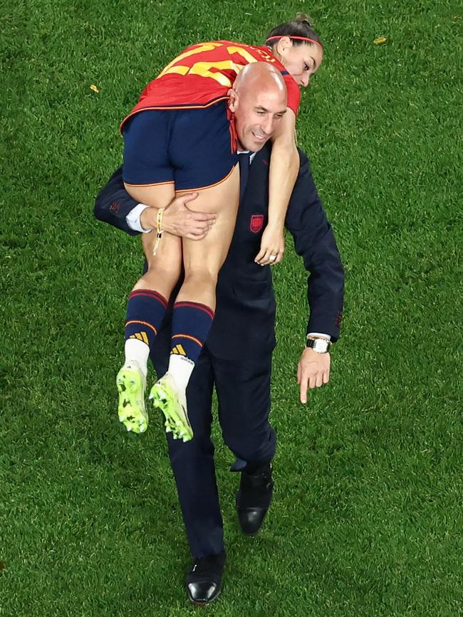 Rubiales carries Athenea del Castillo Beivide as Spain celebrates winning the Women's World Cup in Sydney. Picture: David Gray/AFP