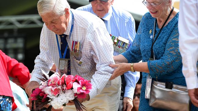 Frank Holland lays a wreath at the Bombing of Darwin Memorial Service. PICTURE: Patrina Malone