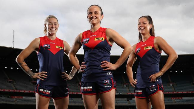 Daisy Pearce (centre) has retired, with Kate Hore (right) taking over as Melbourne captain. Picture: Michael Klein