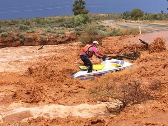 Jet  ski is ridden in flood waters between  Broke Hill and Silverton NSW. Facebook