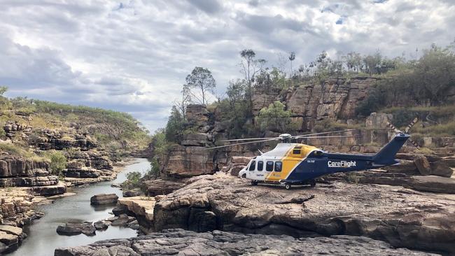 Tourist winched into helicopter after falling at Koolpin Gorge. CREDIT: CAREFLIGHT