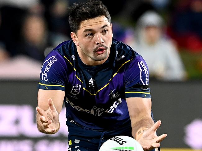 SUNSHINE COAST, AUSTRALIA - JUNE 19: Brandon Smith of the Storm passes the ball during the round 15 NRL match between the Melbourne Storm and the Wests Tigers at Sunshine Coast Stadium, on June 19, 2021, in Sunshine Coast, Australia. (Photo by Bradley Kanaris/Getty Images)