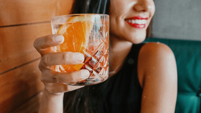 Is drinking having an impact on your tummy? Image: Unsplash