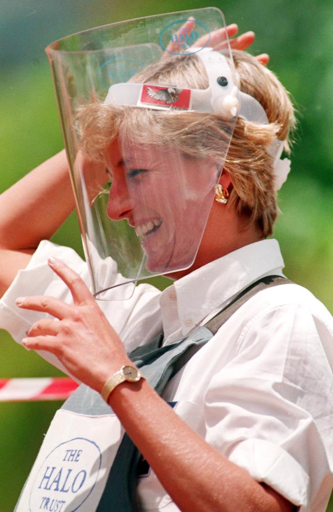 Diana, Princess of Wales, tours a minefield in body armour to see for herself the damage carnage mines cause during her visit to Angola in May 1998. Picture: Arthur Edwards/The Sun.