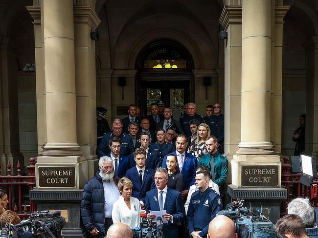 Family members of the slain officers outside the Supreme Court of Victoria after the sentence of the killer truck driver. Picture: NCA NewsWire / Ian Currie