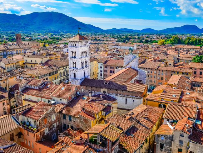 Scenic view of Lucca colorful village from Torre delle Ore, Lucca, Italy