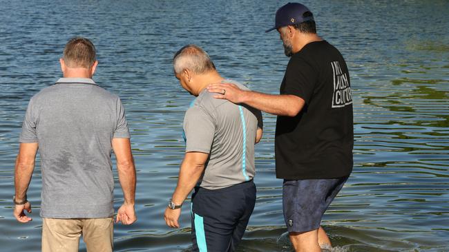 Tom Tate is getting baptised at Evandale Lake during a combined churches service. Paster Sue Baynes and helpers Marshall Gray and Rodger Baynes. Picture Mike Batterham