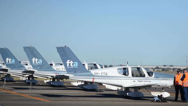 Flight Training Adelaide has laid off dozens of staff and is cancelling insurance on aircraft mothballed by the pandemic. Picture: Brenton Edwards/AAP