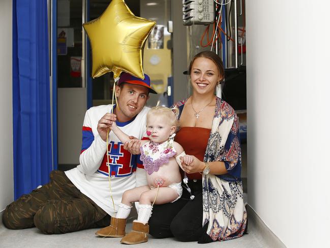 Ben Smith, Elliana Smith, and her mum Maddison Baines. Picture: John Appleyard