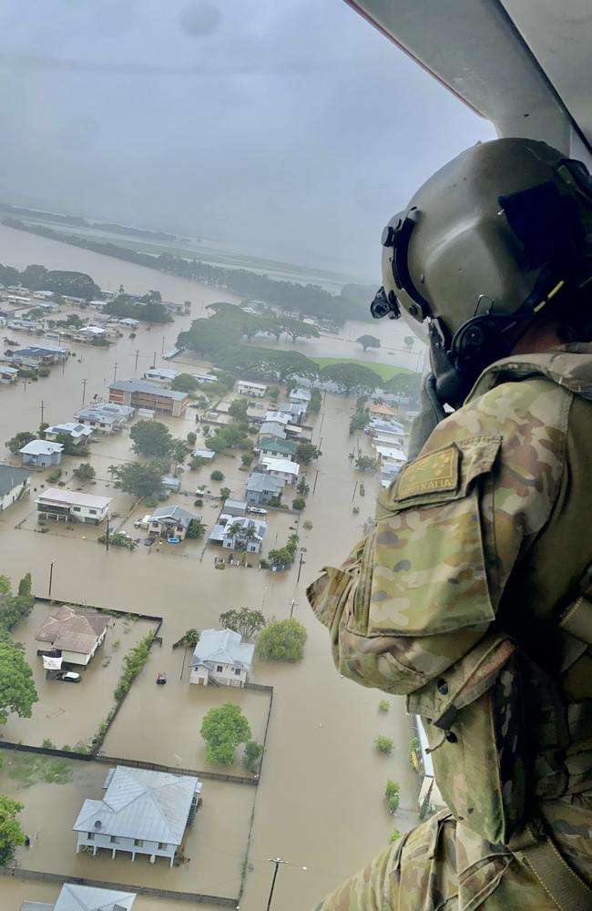 Medical staff take to the skies over an inundated Ingham.