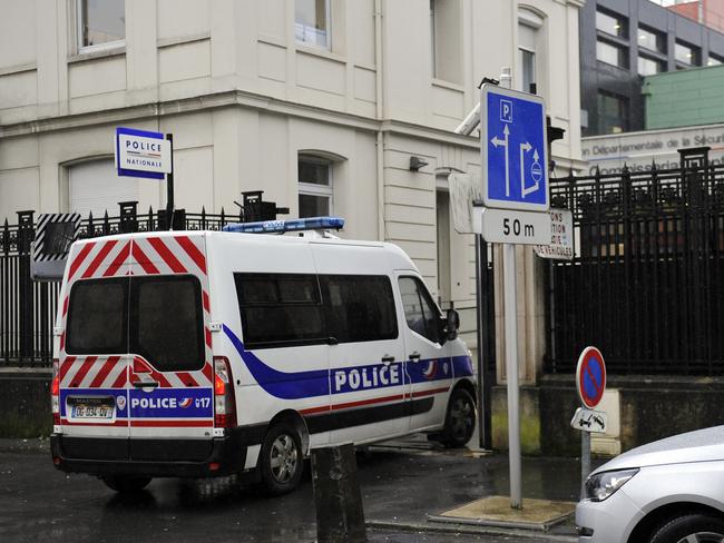 A police truck arrives at the police station of Charleville-Mezieres, northeastern France, where the youngest of three men the police were looking for turned himself in. Picture: Francois Lo Presti