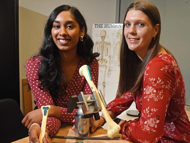 16/11/20 -  Flinders engineering graduates Sharon Prashanth and Georgie Murgatroyd with orthopeadic medical devices at their workplace Austofix in Thebarton.Picture: Tom Huntley