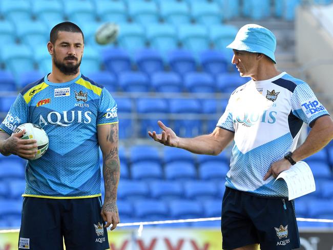 Coach Neil Henry and Nathan Peats during Gold Coast Titans training at Cbus Stadium. Picture: AAP