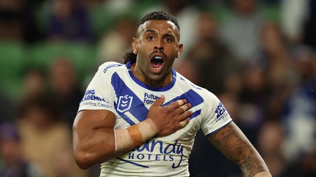 MELBOURNE, AUSTRALIA - APRIL 12: Josh Addo-Carr of the Bulldogs celebrates after scoring a try during the round six NRL match between Melbourne Storm and Canterbury Bulldogs at AAMI Park, on April 12, 2024, in Melbourne, Australia. (Photo by Robert Cianflone/Getty Images)