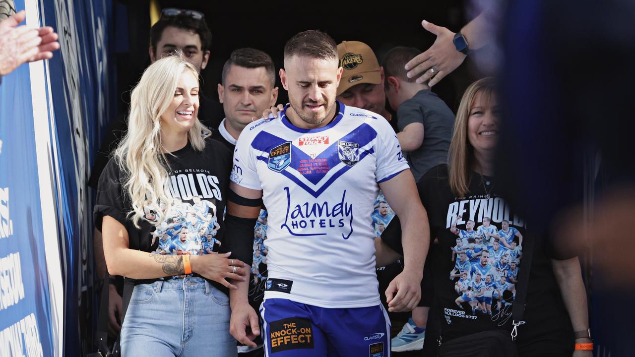 Josh Reynolds runs onto the field for the last time. Picture: Adam Yip