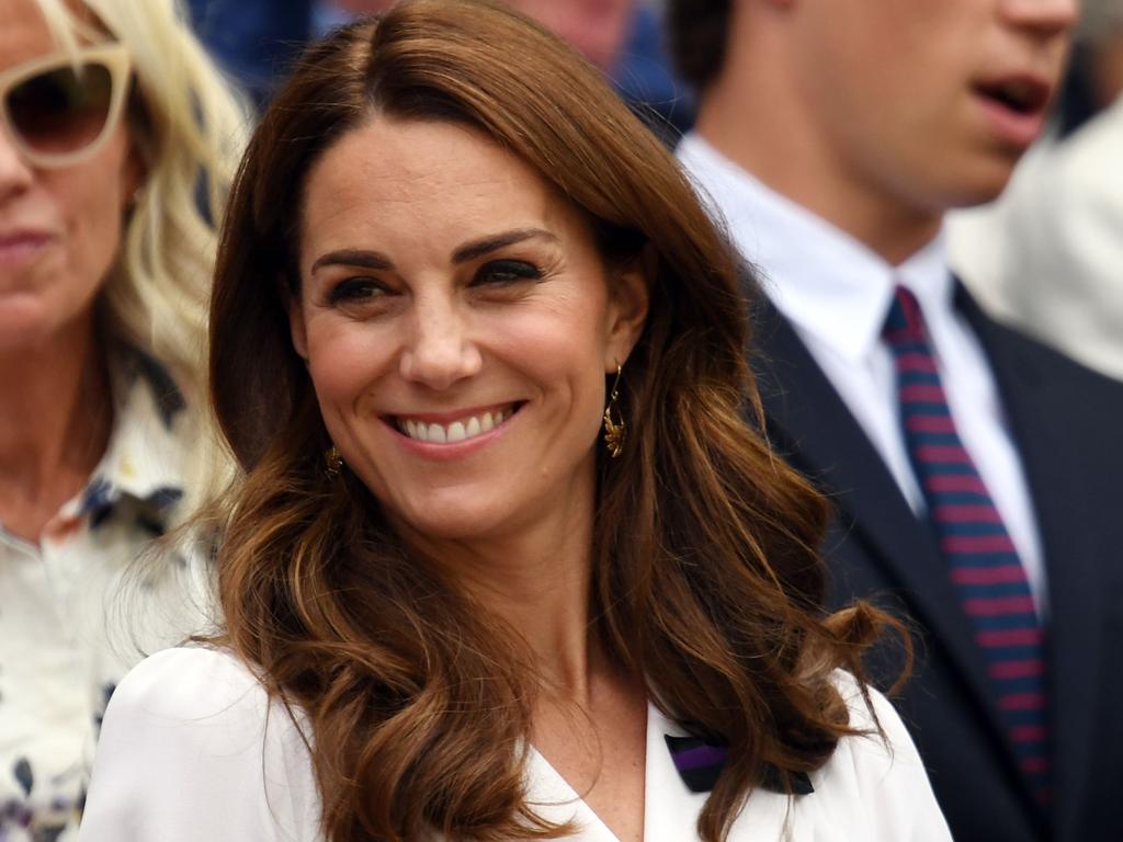 Britain's Catherine, Duchess of Cambridge is all smiles as she watches Germany's Angelique Kerber. Picture: GLYN KIRK / AFP.