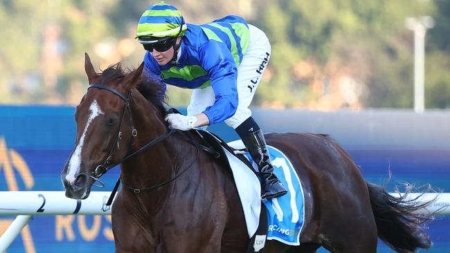 SYDNEY, AUSTRALIA - MARCH 30: Jamie Kah riding Another Wil wins Race 9 Racing And Sports Doncaster Prelude during "Stakes Day" - Sydney Racing at Rosehill Gardens on March 30, 2024 in Sydney, Australia. (Photo by Jeremy Ng/Getty Images)