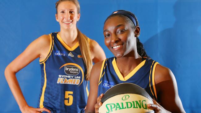 Sydney University Flames basketballers Asia Taylor (R) and Jennifer Hamson are both returning to the club.