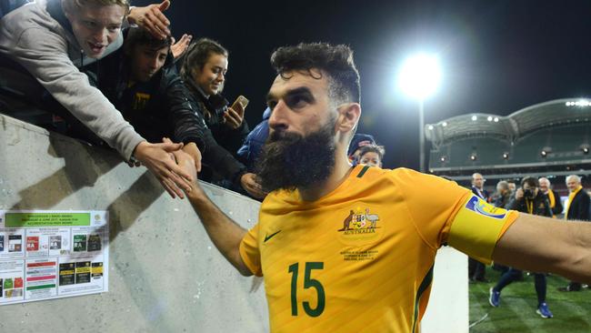 Australian captain Mile Jedinak celebrates a Socceroos win. Picture: AFP Photo