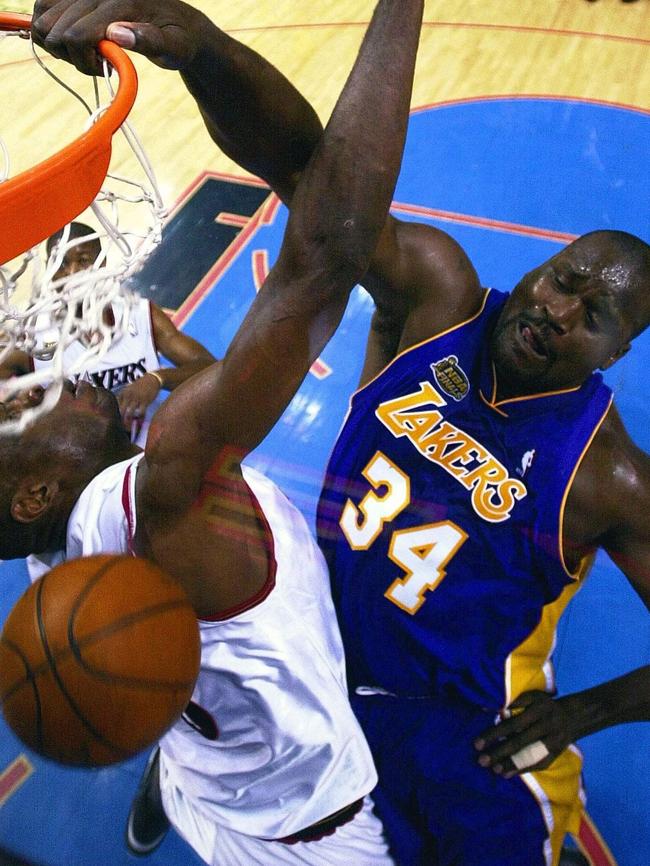 Like we said, he didn’t always get his own way. Here’s Shaq putting him on a poster.