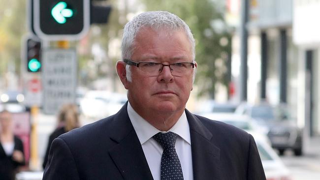 Former West Australian treasurer Troy Buswell is seen leaving the Perth Magistrates Court in Perth, Wednesday, May 13, 2020. Troy Buswell pleaded not guilty to six domestic violence offences and one count of property damage. (AAP Image/Richard Wainwright) NO ARCHIVING