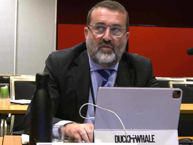 Pictured is Anthony Manning, the Chief Executive of School Infrastructure NSW, which builds new government schools, with a Duck & Whale sticker on his laptop, which is a magazine for Porsche enthusiasts. Picture: Supplied.