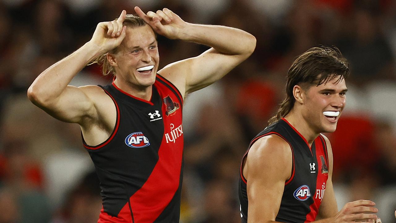 Mason Redman celebrates a goal against the Crows last year.