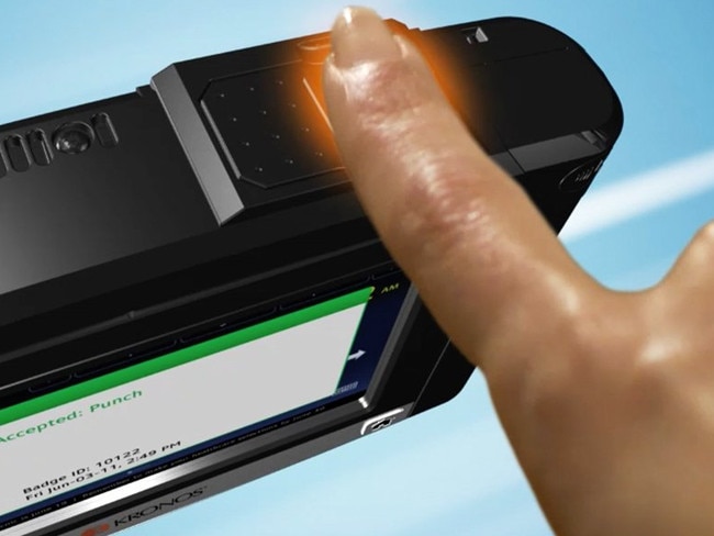 The finger scanner system, called Kronos, that logs employee hours.