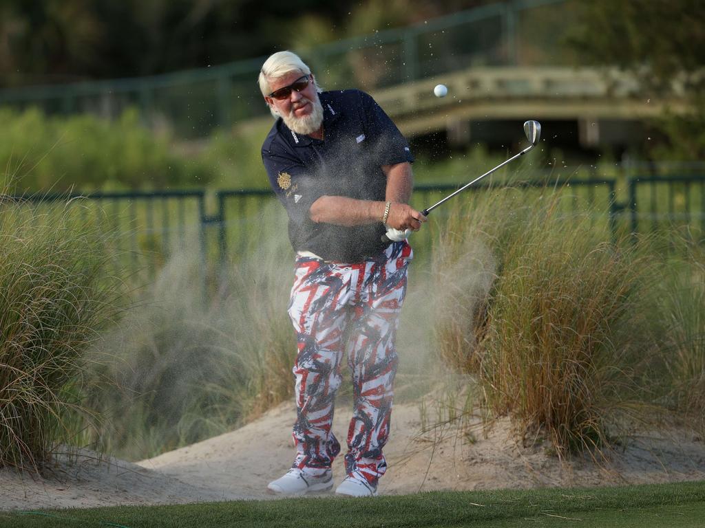 John Daly holes out from the bunker on the first hole. Picture: Patrick Smith/Getty Images