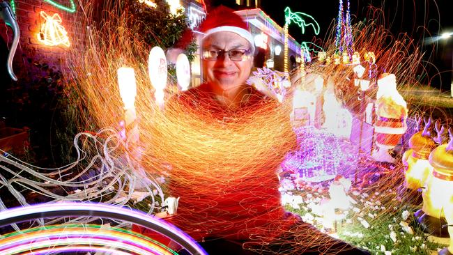 Andrew Milligan has set up his annual Christmas lights display with lots of novelty items in Doncaster East. Picture: Stuart Milligan.