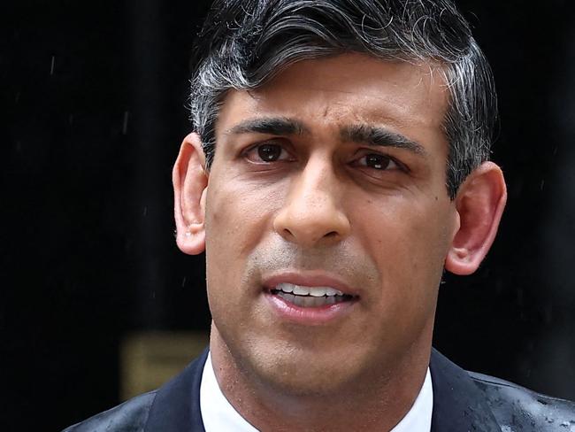 Britain's Prime Minister Rishi Sunak delivers a speech to announce the date of the UK's next general election, at 10 Downing Street in central London, on May 22, 2024. The United Kingdom will head to the polls on July 4, 2024, in a long-anticipated general election called by Prime Minister Rishi Sunak Wednesday. The vote -- the third since the Brexit referendum in 2016 and the first in July since 1945 -- comes as Sunak seeks to capitalise on better economic data to woo voters hit by cost-of-living rises. (Photo by HENRY NICHOLLS / AFP)