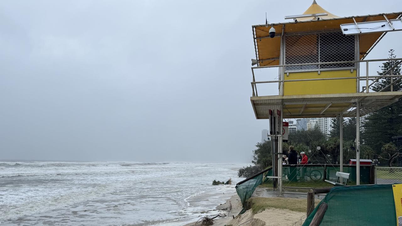 Beaches on brink: Lifeguard tower on edge of eroded sand cliff