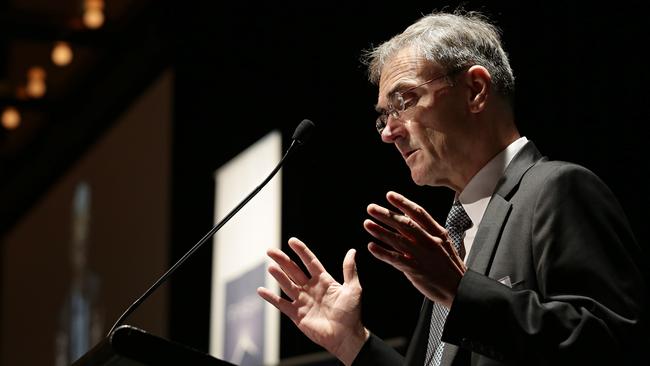 ASIC chair Greg Medcraft speaking at the Finsia event with RBA deputy governor Philip Lowe, and APRA chairman Wayne Byres on a panel. Photographer Adam Yip.