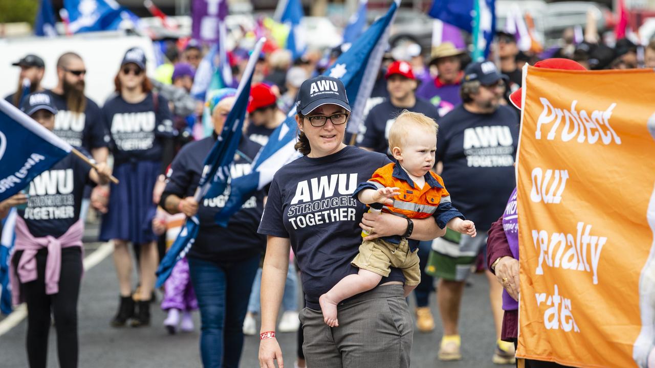 Haidee Janetzki holding her son Patrick Janetzki listens to the speeches at the Labour Day 2022 Toowoomba march, Saturday, April 30, 2022. Picture: Kevin Farmer