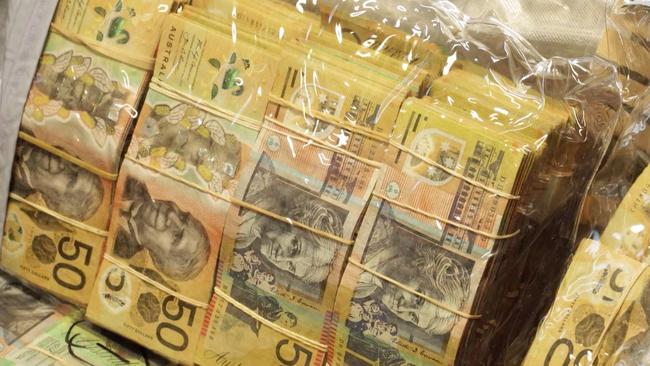 About $640,000 cash was seized during a police operation targetting a Comancheros drug syndicate in Brisbane's bayside.