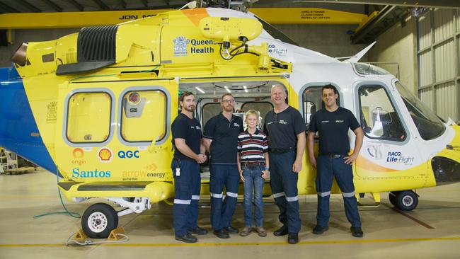 From left to right: RACQ LifeFlight Co-Pilot Nick McDonald, RACQ LifeFlight Critical Care Doctor David Wedgwood, Cooper Prior, Cooper Prior, RACQ LifeFlight Pilot David Hampshire, RACQ LifeFlight Co-Pilot Andrew Caldwell. Picture: LifeFlight