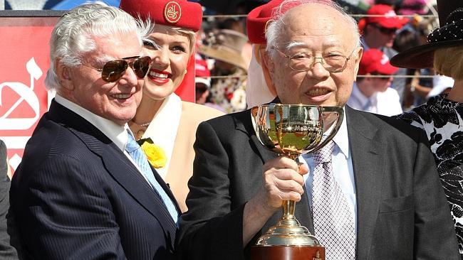 Trainer Bart Cummings and billionaire owner Dato Tan Chin Nam celebrate Viewed's 2009 Melbourne Cup win.  