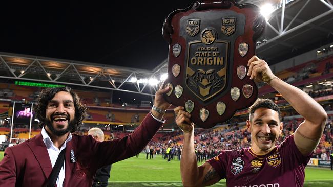 Queensland’s Johnathan Thurston and Billy Slater with the State of Origin shield.