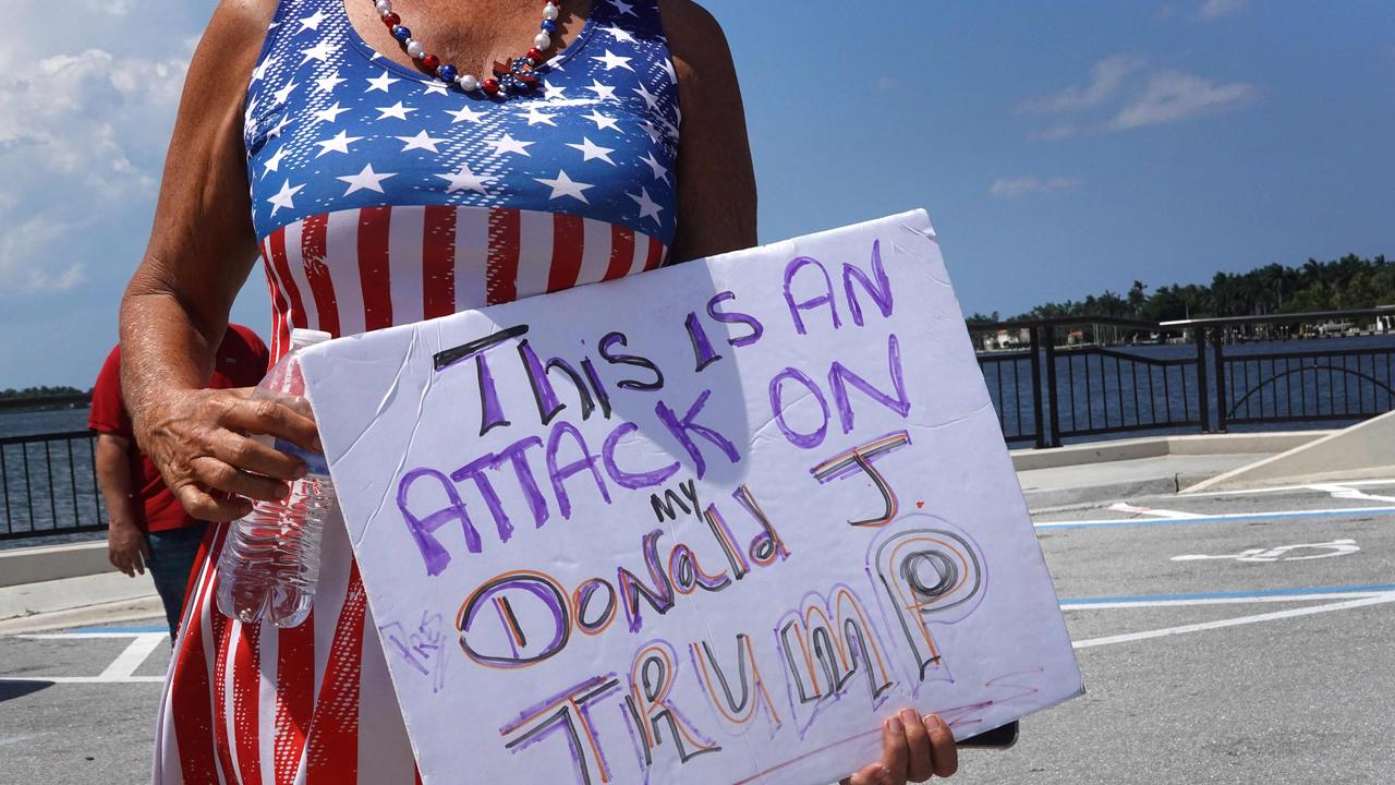 Supporters of former President Donald Trump gather near his Mar-A-Lago home after he was indicted on a new set of charges related to the mishandling of classified documents. Picture: AFP