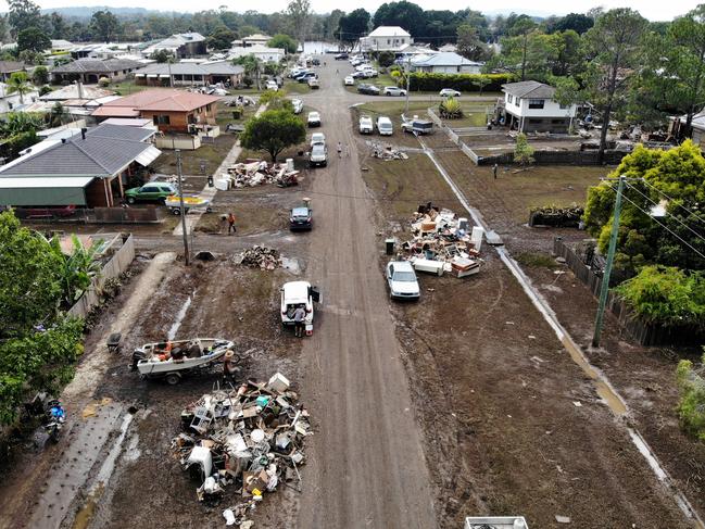 The clean up continues in Lismore on March 6 last year. Picture: Toby Zerna