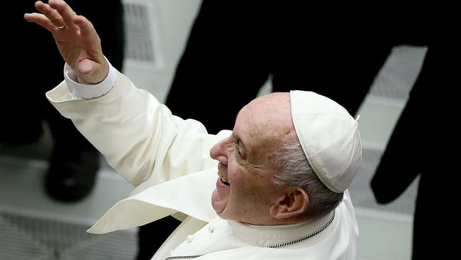 Pope Francis waves to the faithful during an audience with the participants of the Euromoot meeting on August 3.