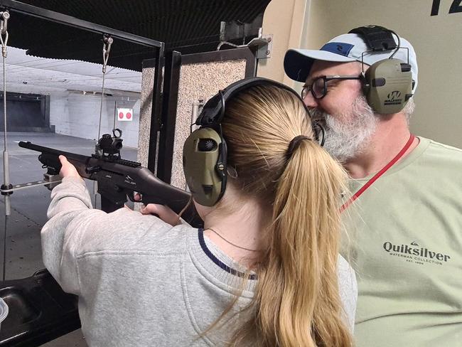 Co-director of the Gold Coast Indoor Shooting Centre, Tim Barron, 50, instructs a teenager on how to fire a tethered shotgun. The newly opened public shooting gallery is based inside the Southport Indoor Pistol Club at 76 Ferry Rd, Southport. Picture: Supplied