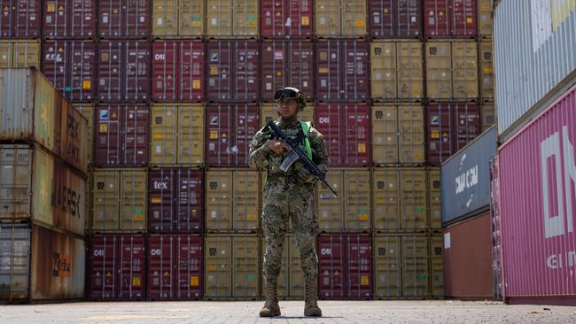 Mexico's Navy watch over containers at the port of Lazaro Cardenas that have a high risk of containing drugs. Picture: Jason Edwards