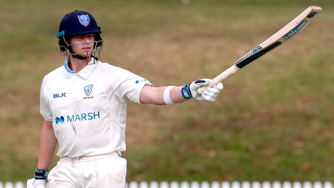 Steve Smith celebrates bringing up his century for NSW. Picture: AAP