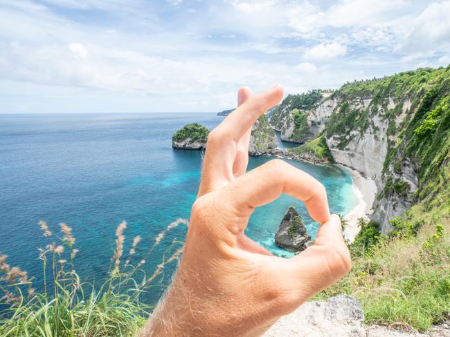 HANDS DOWN Certain hand gestures are considered extremely rude in Greece. Avoid holding your hand up or your palm out to anybody, and try not to make the OK sign (forming a circle with your thumb and forefinger) – it’s super offensive.