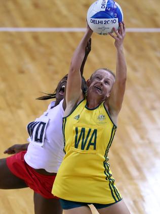 Lauren Nourse stretches for the ball.