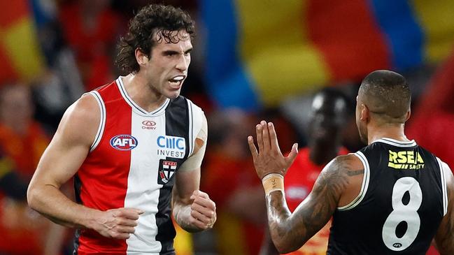 MELBOURNE, AUSTRALIA - JUNE 08: Bradley Hill (right) and Max King of the Saints celebrate during the 2024 AFL Round 13 match between the St Kilda Saints and the Gold Coast SUNS at Marvel Stadium on June 08, 2024 in Melbourne, Australia. (Photo by Michael Willson/AFL Photos via Getty Images)