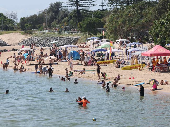 Holiday crowds enjoying a picture perfect Easter Monday at Tallebudgera Creek.  Picture Glenn Hampson