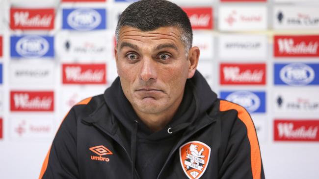A stunned John Aloisi after the loss.