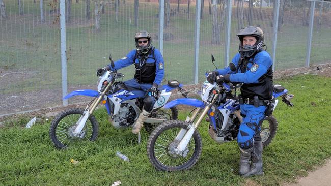 Penrith traffic Sergeant Matt Shirvington and Senior Constable Andy Hayward on trail bikes at Cranebrook, a hotspot for illegal dirt bike riders.